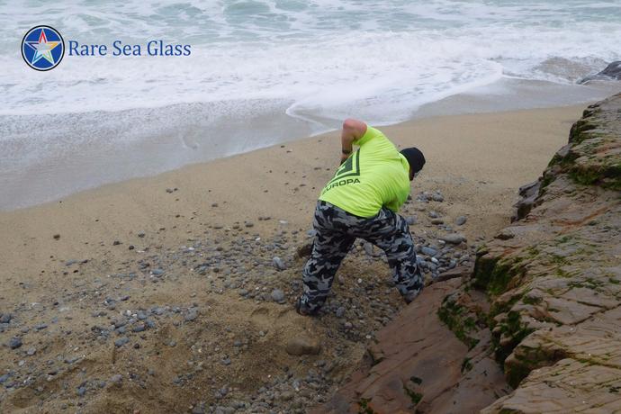 Digging for sea glass at Davenport Beach