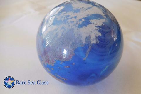 World globe paperweight variant with white cloud cover detail over the continents
